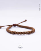 Pulsera de Cordón Café con Nudo Tibetano | Joyería Artesanal
