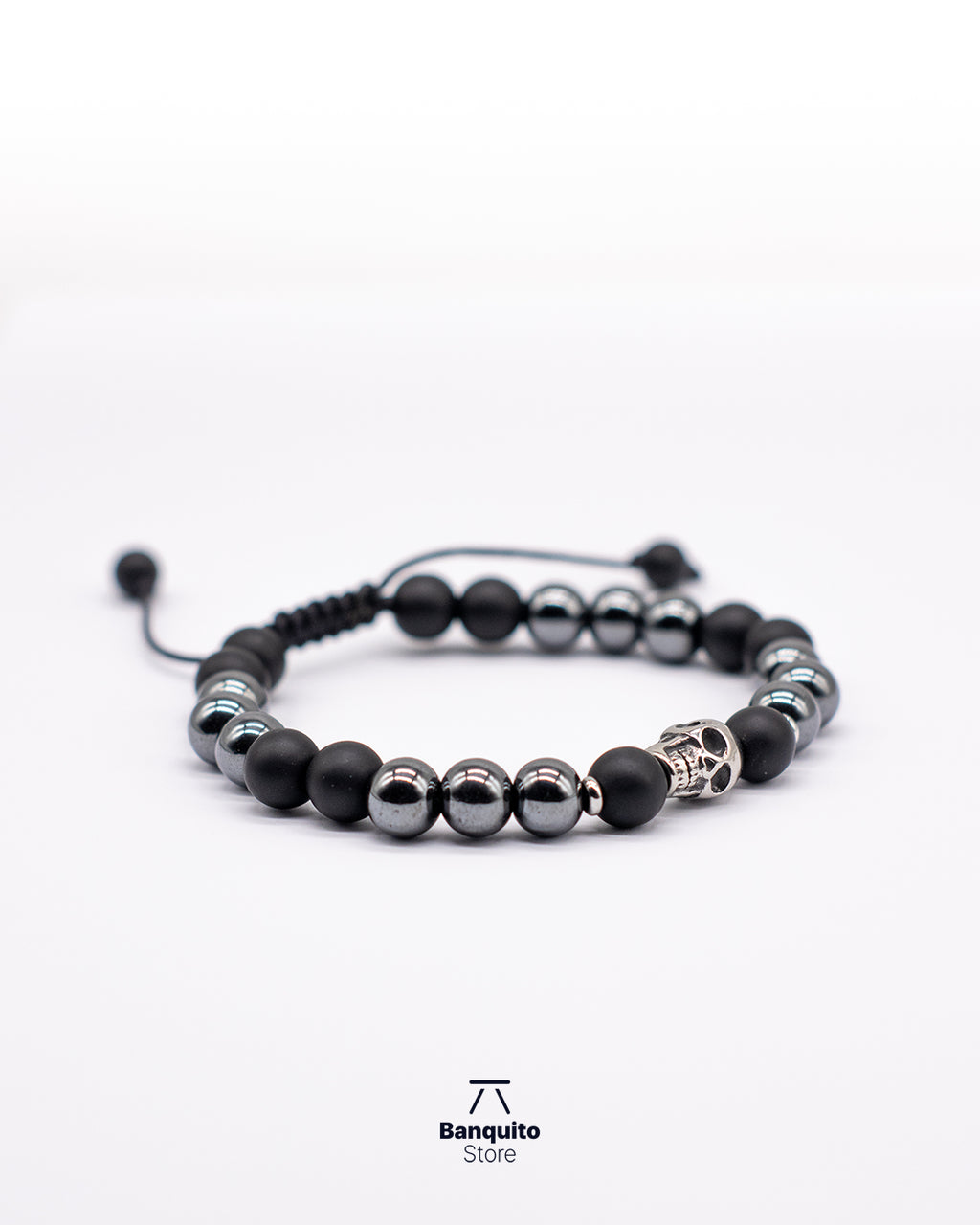 Pulsera de Ónix Matte y Hematita 8 mm con Calavera