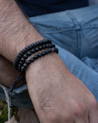 Set de pulsera onix con pulsera de cordón negro de nudo tibetano